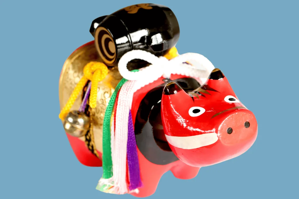 boneco akabeko de papel machê